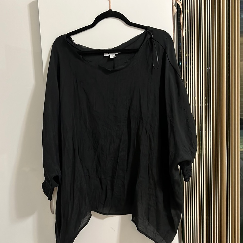 Black blouse with cinched sleeves